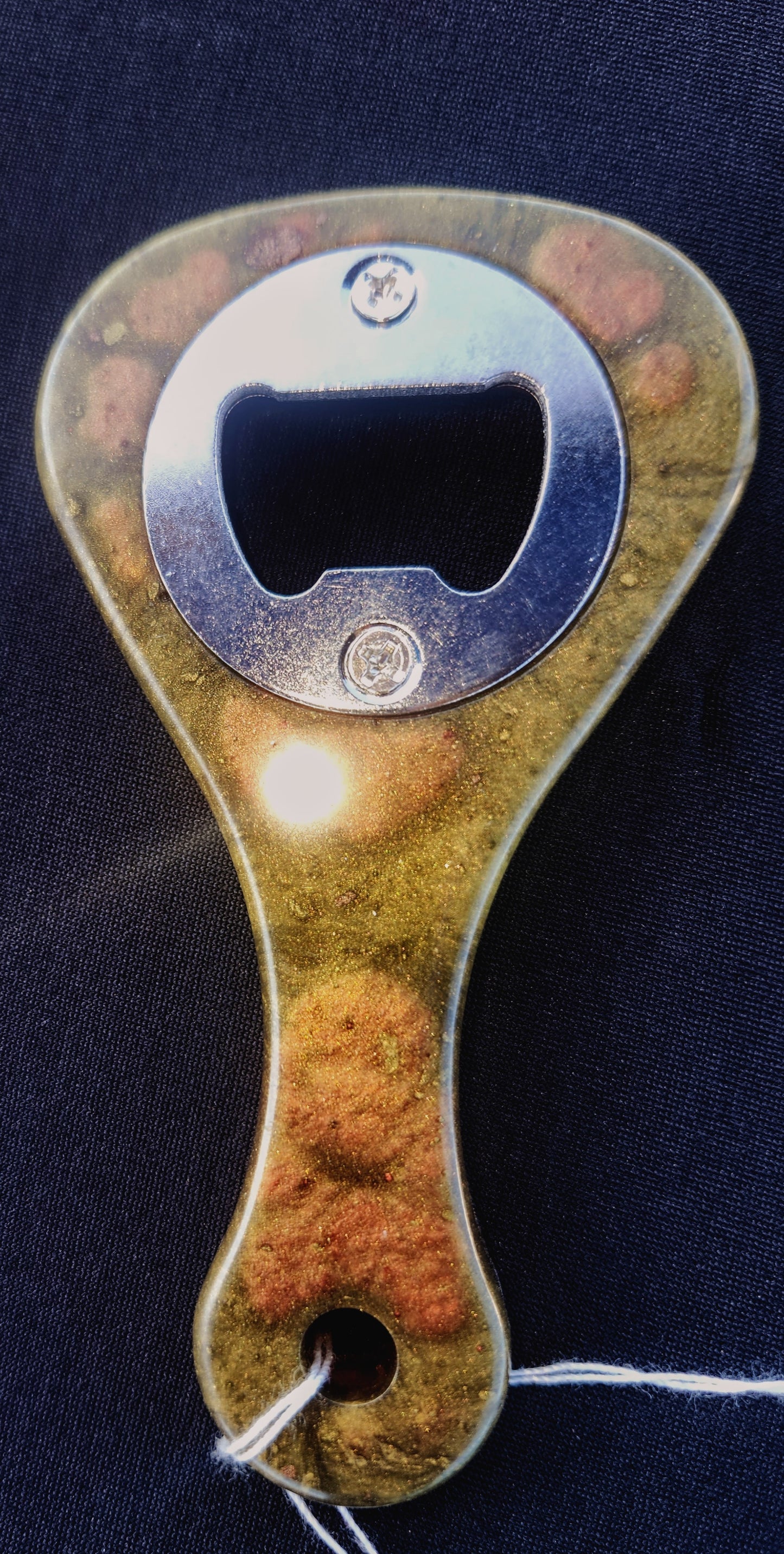 Paddle bottle opener